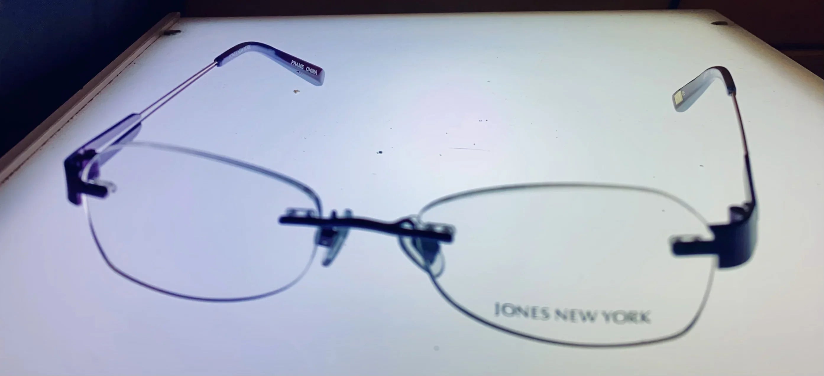 Jones New York Mens Black Rimless Rectangle Eyewear Frame, J471. 51mm