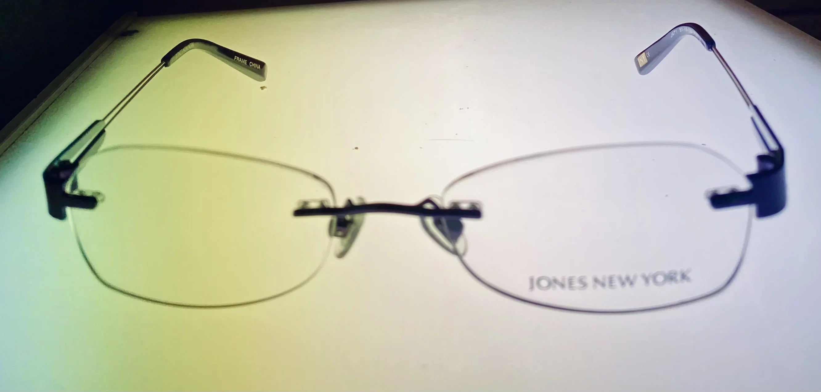 Jones New York Mens Black Rimless Rectangle Eyewear Frame, J471. 51mm